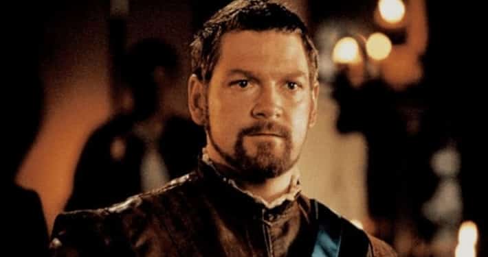 Kenneth Brannagh looking at the camera in brown tunic as Othello